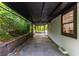A covered carport provides a functional outdoor space, protecting vehicles and items from the elements at 1959 Oana Sw St, Atlanta, GA 30310