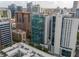 An aerial perspective of the city buildings and rooftops at 20 10Th Nw St # 704, Atlanta, GA 30309