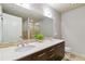 Bright bathroom features double sink vanity with modern fixtures at 20 10Th Nw St # 704, Atlanta, GA 30309