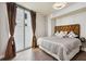Bright bedroom with floor to ceiling windows and stylish decor at 20 10Th Nw St # 704, Atlanta, GA 30309