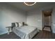 Cozy bedroom featuring stylish hardwood floors and calming, neutral-toned decor at 20 10Th Nw St # 704, Atlanta, GA 30309