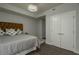 Bedroom features hardwood floors, closet, and contemporary lighting at 20 10Th Nw St # 704, Atlanta, GA 30309