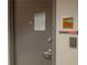 Door with guest suite signage, warning and occupancy information at 20 10Th Nw St # 704, Atlanta, GA 30309