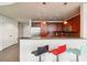 Stylish kitchen with stainless steel appliances and granite countertops, open to the living area at 20 10Th Nw St # 704, Atlanta, GA 30309