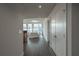 Inviting entryway leading to a bright living room with large windows and stylish furnishings, perfect for relaxing at 20 10Th Nw St # 704, Atlanta, GA 30309