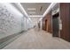 Modern lobby featuring tile flooring, contemporary decor, and elevator access at 20 10Th Nw St # 704, Atlanta, GA 30309