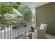 Cozy balcony with comfortable seating and a view of the surrounding trees at 655 Mead Se St # 79, Atlanta, GA 30312