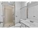 Clean bathroom featuring a glass-enclosed shower and updated fixtures at 655 Mead Se St # 79, Atlanta, GA 30312