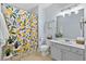 Bright bathroom features a colorful shower curtain, updated fixtures, and ample counter space at 655 Mead Se St # 79, Atlanta, GA 30312