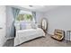 Cozy bedroom with a daybed, natural light, and vintage decor for a charming feel at 655 Mead Se St # 79, Atlanta, GA 30312