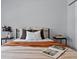 Comfortable bedroom features neutral tones, soft textures, and natural light for a restful ambiance at 655 Mead Se St # 79, Atlanta, GA 30312
