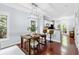 Dining area with modern light fixture, adjacent to the kitchen and filled with natural light at 655 Mead Se St # 79, Atlanta, GA 30312