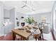 Well-lit dining area boasts hardwood floors and an open floor plan to the living space at 655 Mead Se St # 79, Atlanta, GA 30312