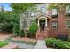 Townhome with well-kept landscaping, brick and siding exterior, and inviting entrance at 655 Mead Se St # 79, Atlanta, GA 30312