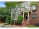 Charming two-story townhome features a brick facade and inviting entrance at 655 Mead Se St # 79, Atlanta, GA 30312