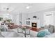 Bright living area features a fireplace, an open floor plan and hardwood floors at 655 Mead Se St # 79, Atlanta, GA 30312
