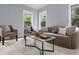 Comfortable seating and lots of natural light fill this inviting living space at 655 Mead Se St # 79, Atlanta, GA 30312