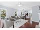 Open-concept floor plan with hardwood floors, and living area leading to the kitchen at 655 Mead Se St # 79, Atlanta, GA 30312