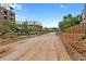 Newly constructed street with trees and building exteriors under a partly cloudy blue sky at 655 Mead Se St # 79, Atlanta, GA 30312