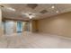 Finished basement featuring neutral carpet and access to additional rooms at 988 Gentry Sw Ln, Marietta, GA 30064