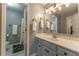 Bathroom features a single sink vanity, tile floors, and shower with curtain at 988 Gentry Sw Ln, Marietta, GA 30064