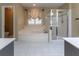 Bathroom features a soaking tub, glass-enclosed shower, and tile floors at 988 Gentry Sw Ln, Marietta, GA 30064