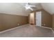 Bedroom with soft carpet, light beige walls, and a ceiling fan at 988 Gentry Sw Ln, Marietta, GA 30064