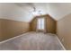 Bedroom with soft carpet, light beige walls, and a window with curtains at 988 Gentry Sw Ln, Marietta, GA 30064