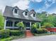 Charming two-story home with a classic architectural style, front porch and well-maintained landscaping at 988 Gentry Sw Ln, Marietta, GA 30064