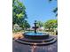 Town square fountain in a park-like setting, featuring manicured lawns and plenty of seating at 988 Gentry Sw Ln, Marietta, GA 30064