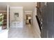 Inviting foyer with marble floors, staircase, and views into the kitchen, creating an open and welcoming space at 988 Gentry Sw Ln, Marietta, GA 30064