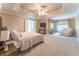 Spacious primary bedroom features a tray ceiling, sitting area, and ensuite bathroom access at 988 Gentry Sw Ln, Marietta, GA 30064