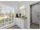 Bright bathroom with granite countertops, a single sink, and a tiled shower at 11155 Highfield Chase Dr, Johns Creek, GA 30097