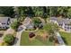 Exterior view of a well-kept house and the surrounding lawn at 11155 Highfield Chase Dr, Johns Creek, GA 30097