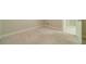 Bedroom features neutral carpet and access to ensuite bath at 1609 Holly Ridge Dr, Loganville, GA 30052