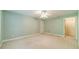 Neutral bedroom with two closets, two entries and a ceiling fan at 1609 Holly Ridge Dr, Loganville, GA 30052