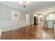 Elegant kitchen seamlessly connecting to the breakfast nook, offering a bright and functional space for cooking at 1609 Holly Ridge Dr, Loganville, GA 30052