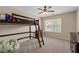 Bedroom featuring a ceiling fan, carpet, a bunk bed and natural light at 2580 Glaramara Ter, Cumming, GA 30041