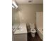 Traditional bathroom with modern white vanity and matching toilet and shower at 2914 Landmark Se Dr, Conyers, GA 30094