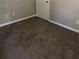 A clean bedroom with carpet and a large window for natural light at 2914 Landmark Se Dr, Conyers, GA 30094