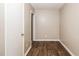 A well-lit hallway features a clean, modern design with new wood floors at 2914 Landmark Se Dr, Conyers, GA 30094