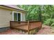 Cozy back deck with wood railings and sliding glass door provides a private outdoor retreat at 3117 Calumet Nw Cir, Kennesaw, GA 30152