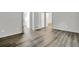 Spacious bedroom with wood-look floors and connecting doorways at 3117 Calumet Nw Cir, Kennesaw, GA 30152