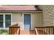 This charming house featuring a well-kept front entrance complete with a small wooden porch and beautiful outdoor light at 3117 Calumet Nw Cir, Kennesaw, GA 30152