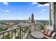 Balcony with city views, seating, and a small outdoor table at 400 W Peachtree Nw St # 3801, Atlanta, GA 30308