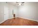 Empty bedroom with hardwood floors and ensuite bathroom at 400 W Peachtree Nw St # 3801, Atlanta, GA 30308
