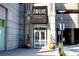 Exterior of building featuring the front entrance and tasteful landscaping at 400 W Peachtree Nw St # 3801, Atlanta, GA 30308