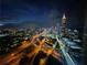 Stunning nighttime city view showcasing the illuminated skyline and bustling highway system at 400 W Peachtree Nw St # 3801, Atlanta, GA 30308