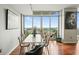 Dining area with city views, floor-to-ceiling windows, and modern furnishings at 400 W Peachtree Nw St # 3801, Atlanta, GA 30308