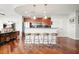 Modern kitchen with bar seating, stainless steel appliances, and open concept design at 400 W Peachtree Nw St # 3801, Atlanta, GA 30308